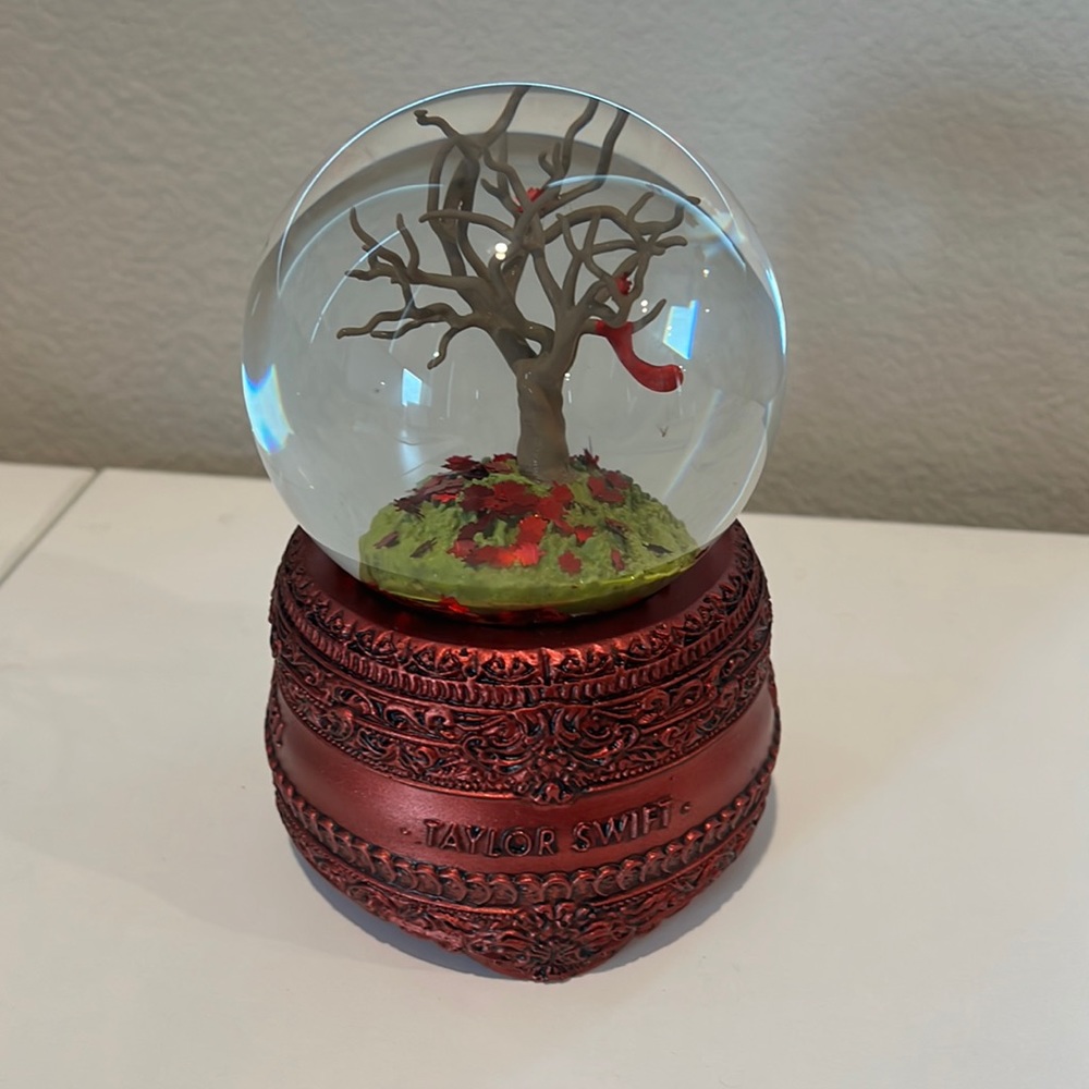 Taylor Swift “Red” Snow globe. Plays the song “All too well.”